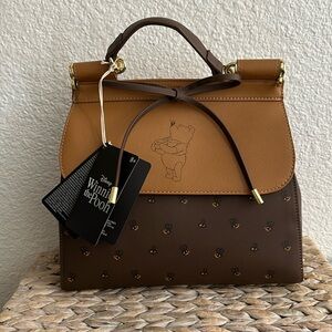 NWT Pooh bear loungefly brown purse with a bow and bee print